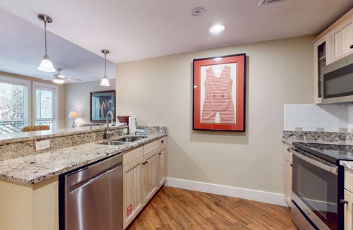 Baytowne Wharf Condo | Pilot House getaway steps to shops & dining with pool & fitness center