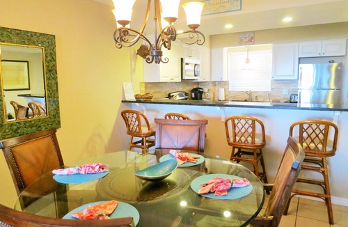 Fernandina Beach Condo | Private PIER Ground Floor Oceanfront Condo with King Bed, Tennis Courts & Pool!