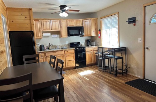 Peninsula Village Cabin | Remodeled cozy 2-bedroom cabin, pet friendly, free boat launch & slip, lakeside