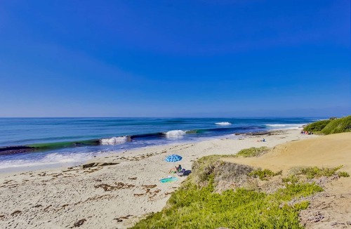 Beach Barber Tract Apartment | Sea Glass Hideaway, Designer Studio, Dog Friendly, Private Patio and Parking!