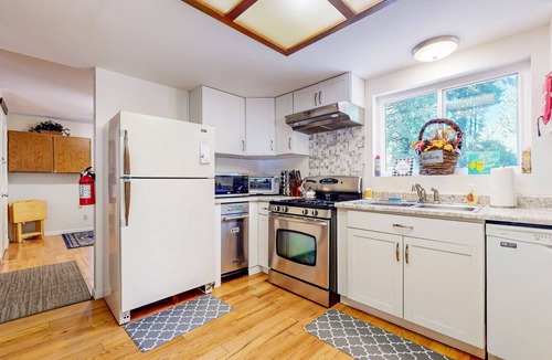 Shingletown House | Serene retreat w/2 kitchens, 2 living rooms, huge deck+ hot tub-creekfront view