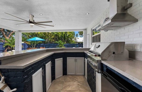 Dania Beach House | Spacious Oasis! Pool, outdoor bar& kitchen, private playground, pool table!