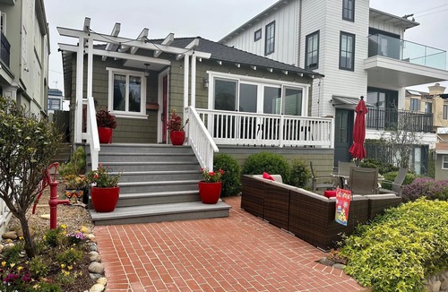 The Strand House | Steps to the sand! Luxury Ocean View home on walk-street!