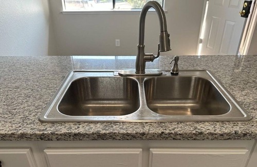 Roosevelt House | Upper level unit with one bedroom and one bathroom and fresh interior paint