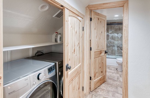 West Village House | Wonderful Retreat Near the Lake W/ Gourmet Kitchen, Free WIFi & Wraparound Deck!