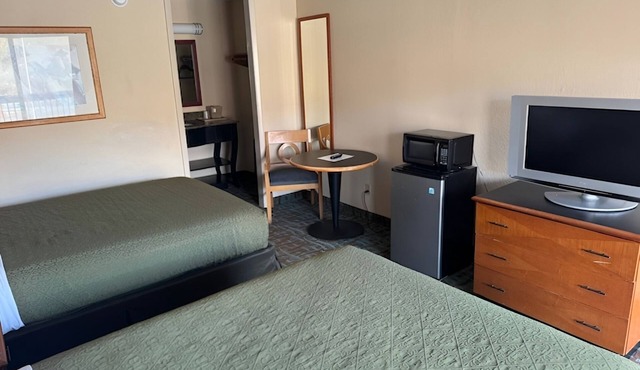 2-Room Escape with Free Parking & Breakfast – Convenient I-40 Location