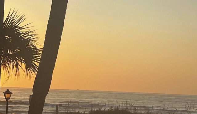 Amazing sunrises & beach views from private balcony & steps from the sand!