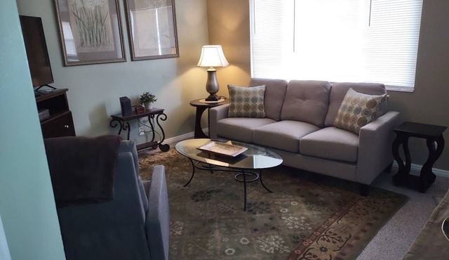 Charming 3 bed/2 bath condo with Central AC/Heat & 2 car garage.