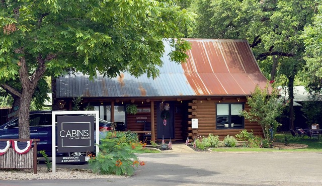 Creek House — 2BR Log Cabin + Private Cypress Creek | On Wimberley Square