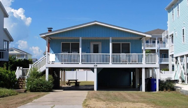 Experience oceanfront bliss at The Lee Cottage in Holden Beach, NC, perfect for 6 guests.