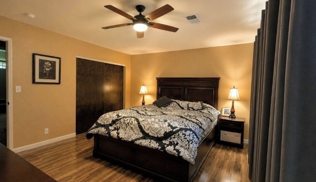 Hillside home with large deck in a woodsy area. Sleeps 8