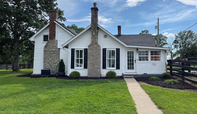 Historic circa 1790 2 bedroom farmhouse on 6 acres in beautiful Paris, Kentucky.