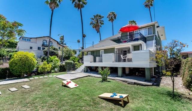 Normandie Manor | 6BR Hollywood Sign Views, Chef's Kitchen, Gated + Dog Friendly