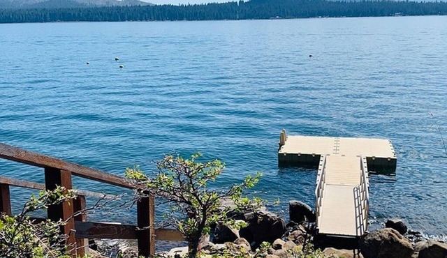 Serene Lake-Front Getaway with Private Dock and Decks for Fun and Relaxation