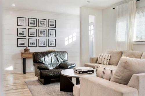 Surf Farmhouse | Hot Tub, Big Backyard, Sleeps 7!