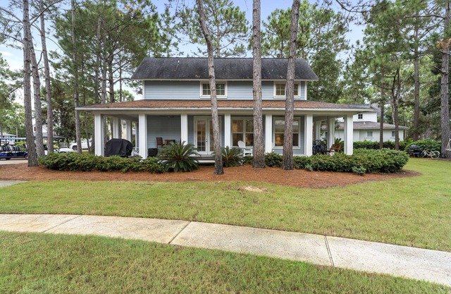 Beach Cottage w/ TWO GOLF CARTS, Porch, Beach Tram, Near Pool/Hot Tub & Beach