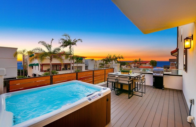 Ocean-view condo with private hot tub - walk to beach - snowbird-friendly