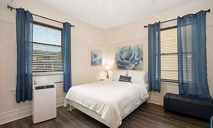 Little Italy House | Room 110 Corner unit! 10 foot plus ceiling. Hawthorn Historic Inn