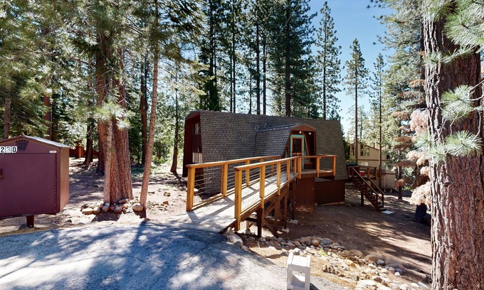 Kings Beach House | Woodland home in quiet location with deck, fireplace & entertainment options