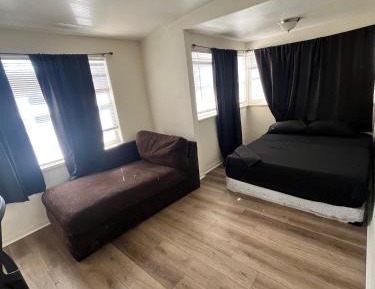 Queen Room with Shared Bathroom