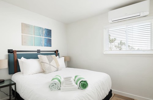 Townsite Condo | Oceanview Queen Suite Steps from the Sand (304)